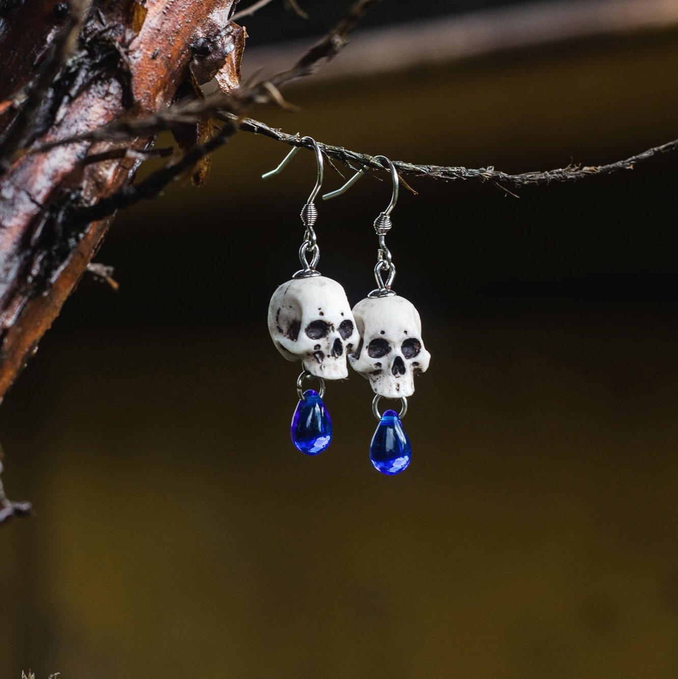 Human skull earrings with blue beads – gothic gift idea
