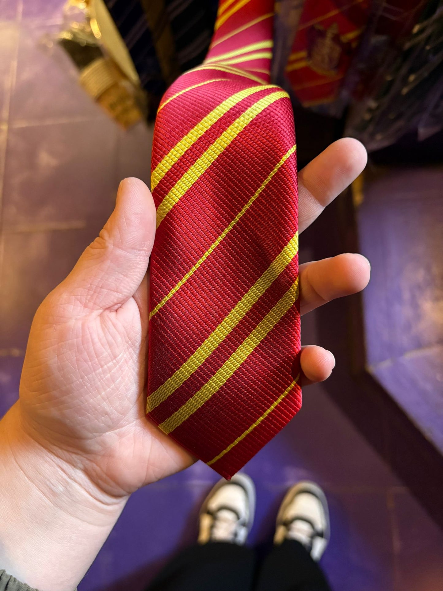 Cūkkārpas torņu kaklasaite ar emblēmu Harijs Poters