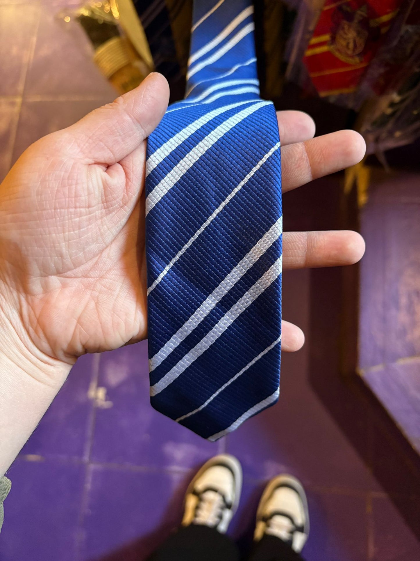 Cūkkārpas torņu kaklasaite ar emblēmu Harijs Poters