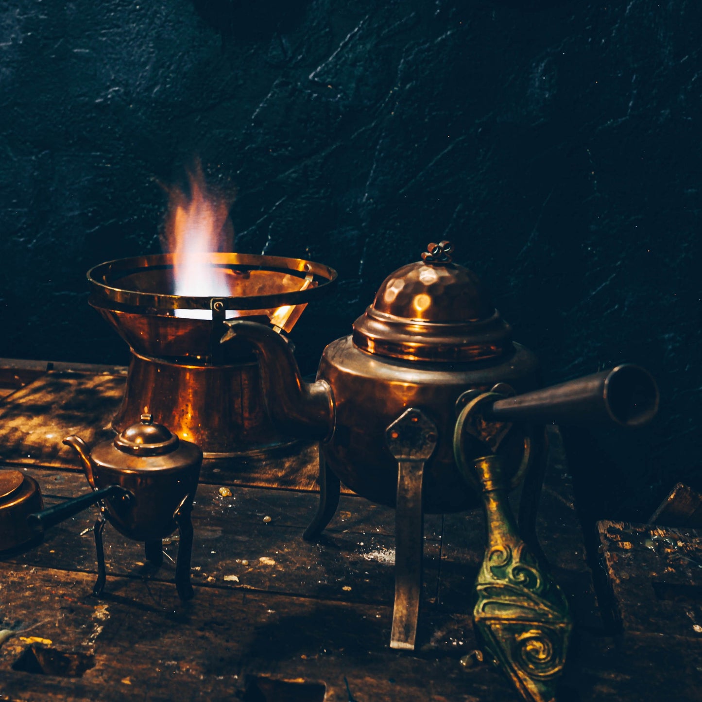 Decor of the quest room - hearth, teapots, vial